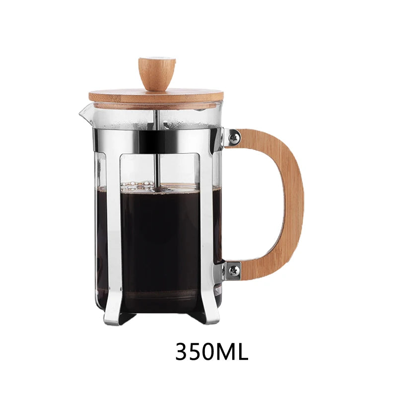350ml French press coffee maker with wooden handle and lid on a white background, containing coffee.