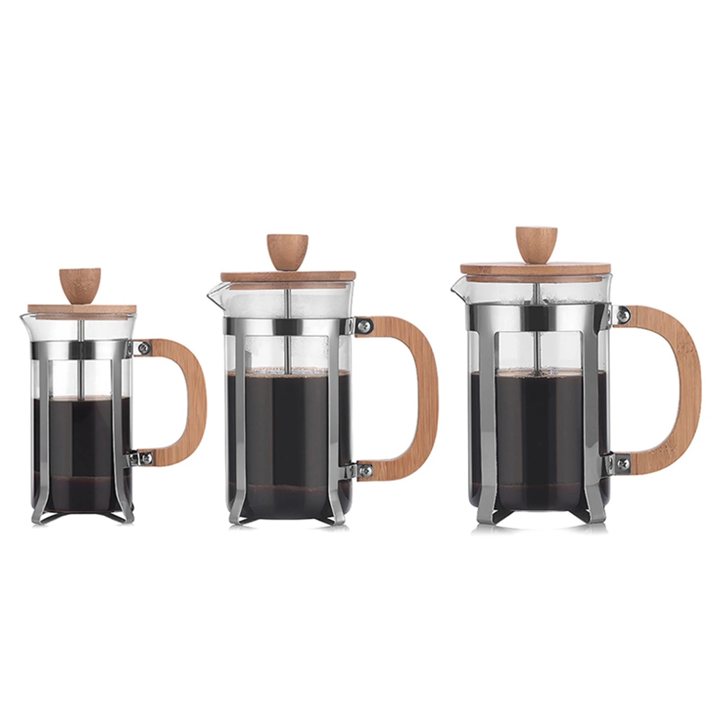 Three French press coffee makers with wooden handles and lids on a white background 