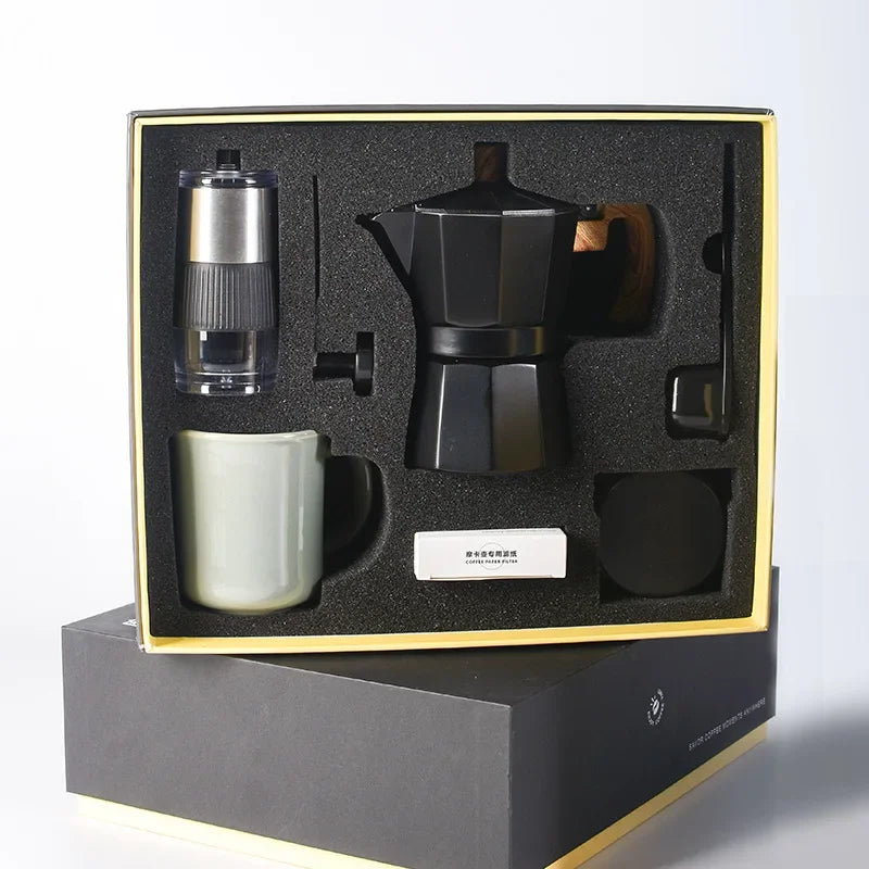 Black Coffee-making set with a pot, mug, and other accessories in a black box on a white background