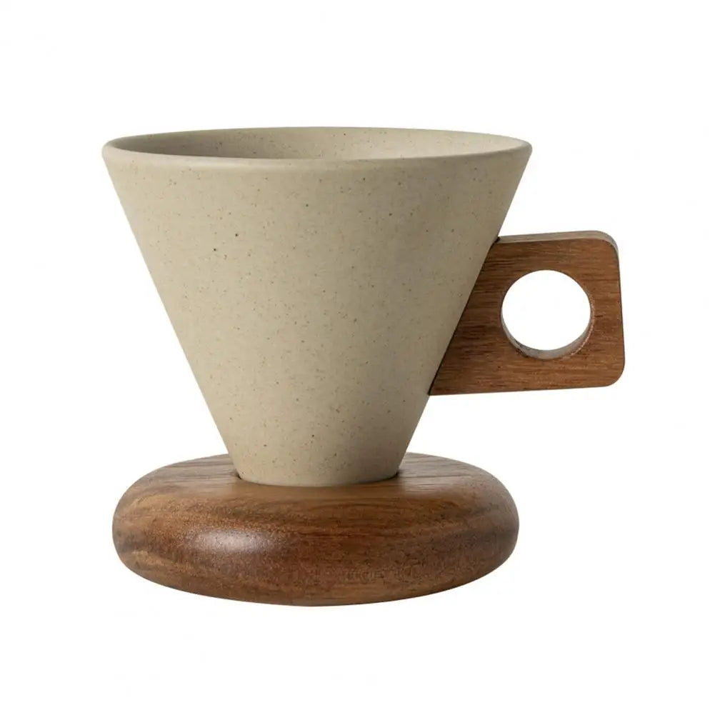 Single conical ceramic coffee mug with square wooden handle on a round wooden saucer, white background